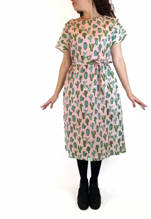 Pretty Parcel pink dress with cactus print size 10